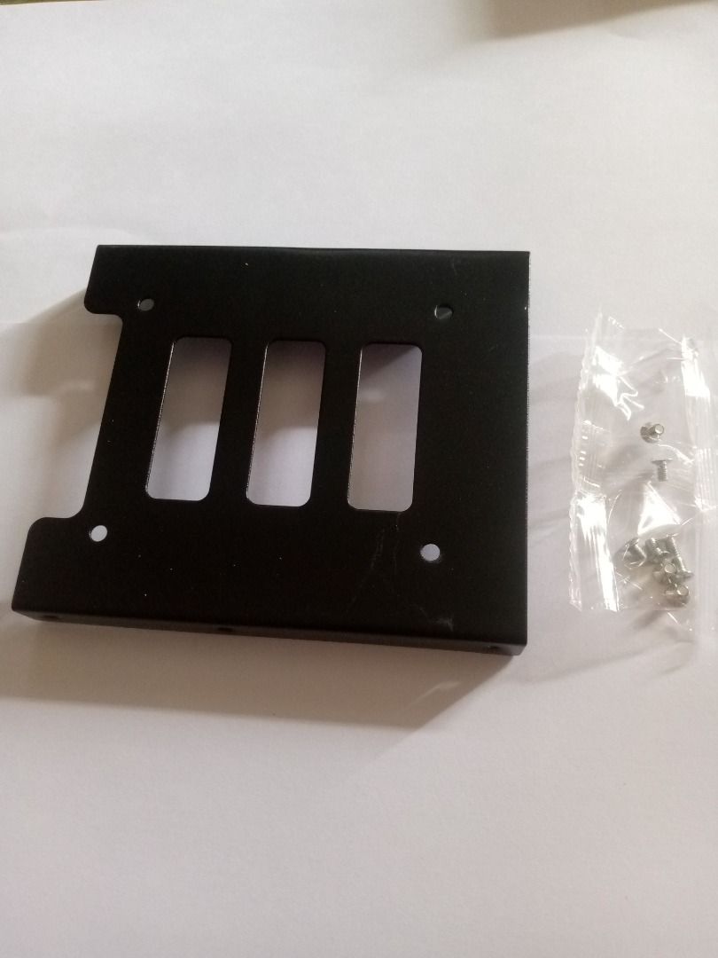 HDD SSD 2.5 to 3.5 Mounting Bracket Adapter (Category: Hard Disks & Thumbdrives) located in Pateros City. Submitted by eztech9 (Listing ID 1399555563, Image 2). Description: HDD SSD 2.5 to 3.5 Mounting Bracket Adapter Holder Dock for small 2.5 solid state drive and hard drive with screws included. BRGY. Santa Ana, Pateros, NCR.