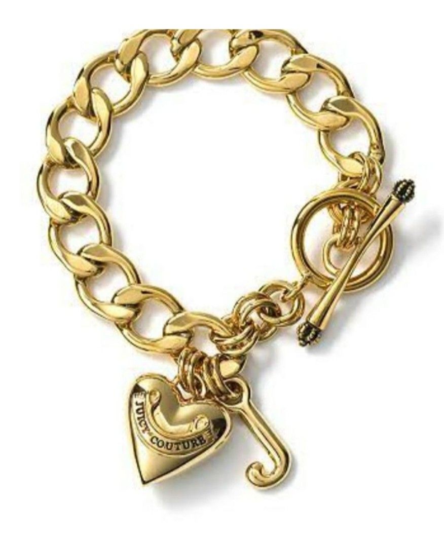JUICY COUTURE STARTER CHARM BRACELET, GOLD (Category: Bracelets) located in Quezon City. Submitted by stuffiesetc (Listing ID 1399482709, Image 1). Description: JUICY COUTURE STARTER CHARM BRACELET GOLD Guaranteed authentic. used a few times in good condition. minor signs of wear. no rust.in original box ( box has some minor damage on the inside due to storage. bought in the u.s. for about Php10,000. ABOUT THIS ITEM Approximately 7.5" long Gold t