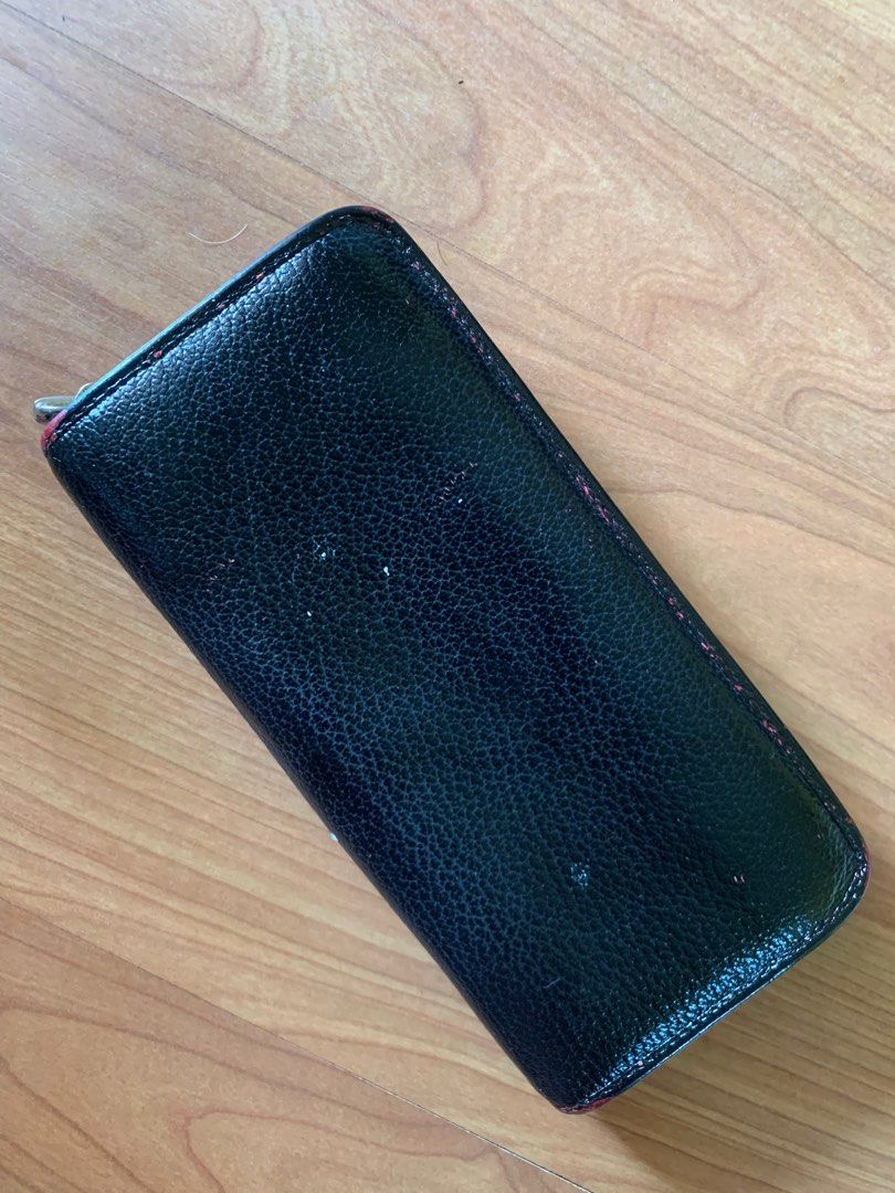 Loewe wallet (Category: Luxury Bags & Wallets) located in Las Pinas. Submitted by yolk.ph (Listing ID 1399537010, Image 2). Description: Loewe long wallet 100% authentic from japan Flaw: orig color showing up (recolored); broken zipper Can just be used as project wallet Can give this as a freebie when u purchase one luxury wallet or bag.