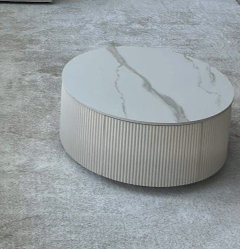 Luxury Industrial Coffee Table - White Marble Top (Category: Tables & Sets) located in Muntinlupa City. Submitted by zaia_k (Listing ID 1399462764, Image 1). Description: - Elegant coffee table - White marble top - Unique fluted design - Round shape (70cm diameter) - 30cm height - Hidden drawer for storage - Ideal for modern living rooms Purchased price: PHP 38,000.