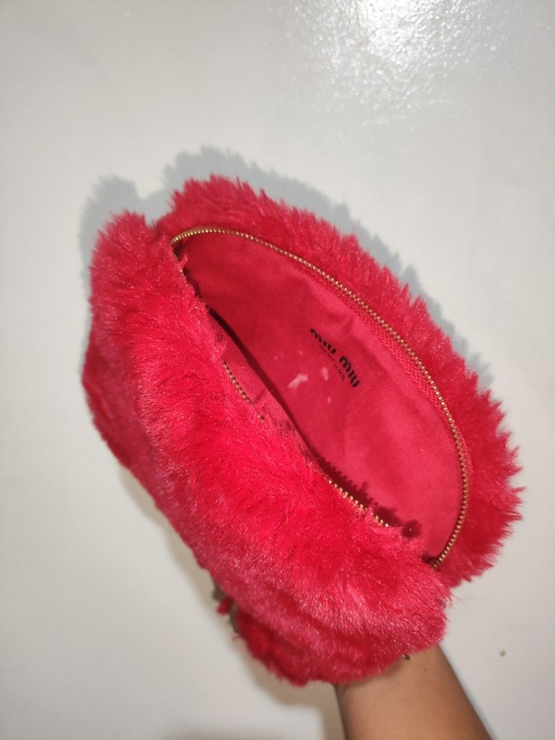 MIU MIU POUCH (Category: Luxury Bags & Wallets) located in Romblon. Submitted by teppthrift. (Listing ID 1399544952, Image 2). Description: MIU MIU POUCH ISSUE NASA PIC VERY GOOD CONDITION.
