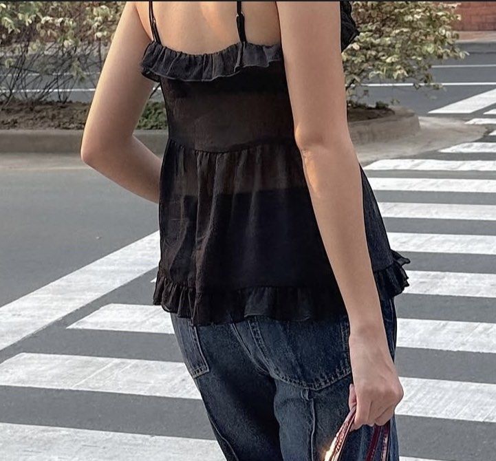 Monki Frilled Sleeveless Blouse - Black/L (Category: Blouses) located in Quezon City. Submitted by mer.declutters (Listing ID 1399502406, Image 3). Description: - Black Monki sleeveless blouse - V-neckline with tie detail - Adjustable spaghetti straps - Ruffled hem - Sheer fabric - Size: International L - Bought from Zalora - Super great as it is or for layering!!.