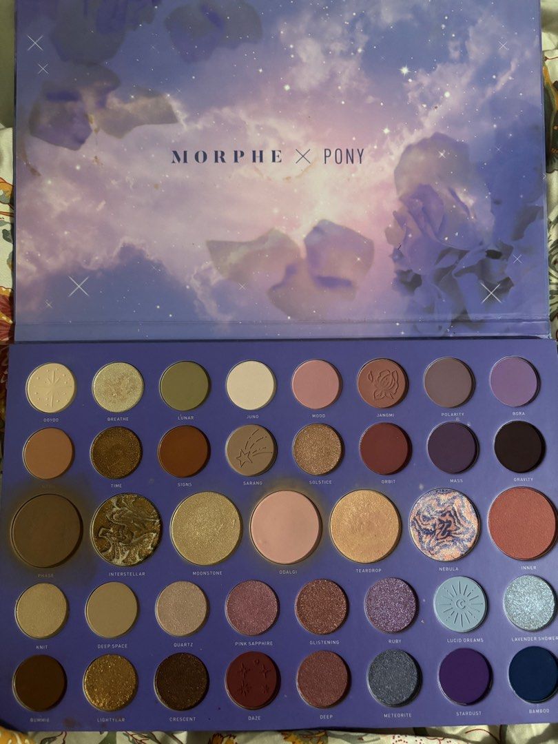 Morphe x Pony Constellation Sky Eyeshadow Palette (Category: Makeup) located in Las Pinas. Submitted by gabriellen10737 (Listing ID 1399588131, Image 2). Description: - Morphe x Pony Constellation Sky palette Most shades barely used/never used Only ones used a lot are the bronzer and baby pink blush in the middle big pans (see photos for reference) Rfs: decluttering since i barely use eyeshdadow Location: Las Pinas City MOD: same day/j&t/ggx MOP: