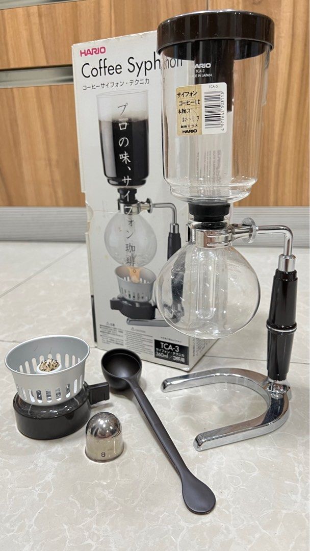 Original Hario Coffee Syphon TCA-3 (Category: Coffee Machines & Makers) located in Pasig City. Submitted by ktnlm (Listing ID 1399598802, Image 1). Description: Hario Coffee Syphon coffee maker (with box) TCA-3 with parts Missing filter only, other parts complete and working Works properly, lightly used RFS: Excess item MOP: BPI/BDO/GCash Shipping fee c/o buyer.