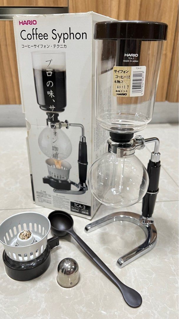 Original Hario Coffee Syphon TCA-3 (Category: Coffee Machines & Makers) located in Pasig City. Submitted by ktnlm (Listing ID 1399598802, Image 3). Description: Hario Coffee Syphon coffee maker (with box) TCA-3 with parts Missing filter only, other parts complete and working Works properly, lightly used RFS: Excess item MOP: BPI/BDO/GCash Shipping fee c/o buyer.