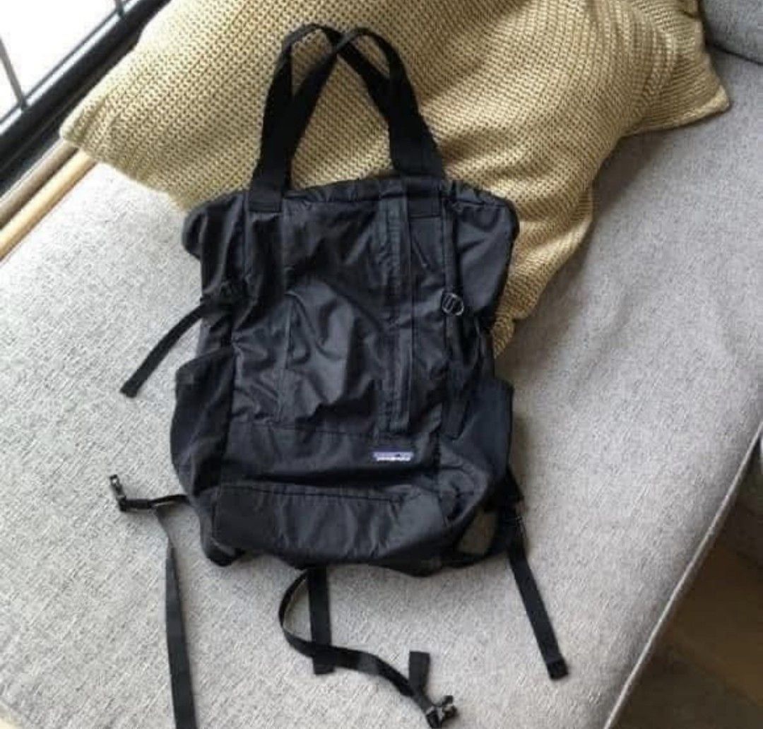 Patagonia Black Convertible Tote Pack (Category: Backpacks) located in Makati City. Submitted by kaecee. (Listing ID 1399503013, Image 3). Description: - Patagonia Tote Pack - Converts from tote to backpack - Black exterior - Multiple compartments - Adjustable straps - Patagonia logo patch - Durable and lightweight material - Top handles and backpack straps for carrying options.