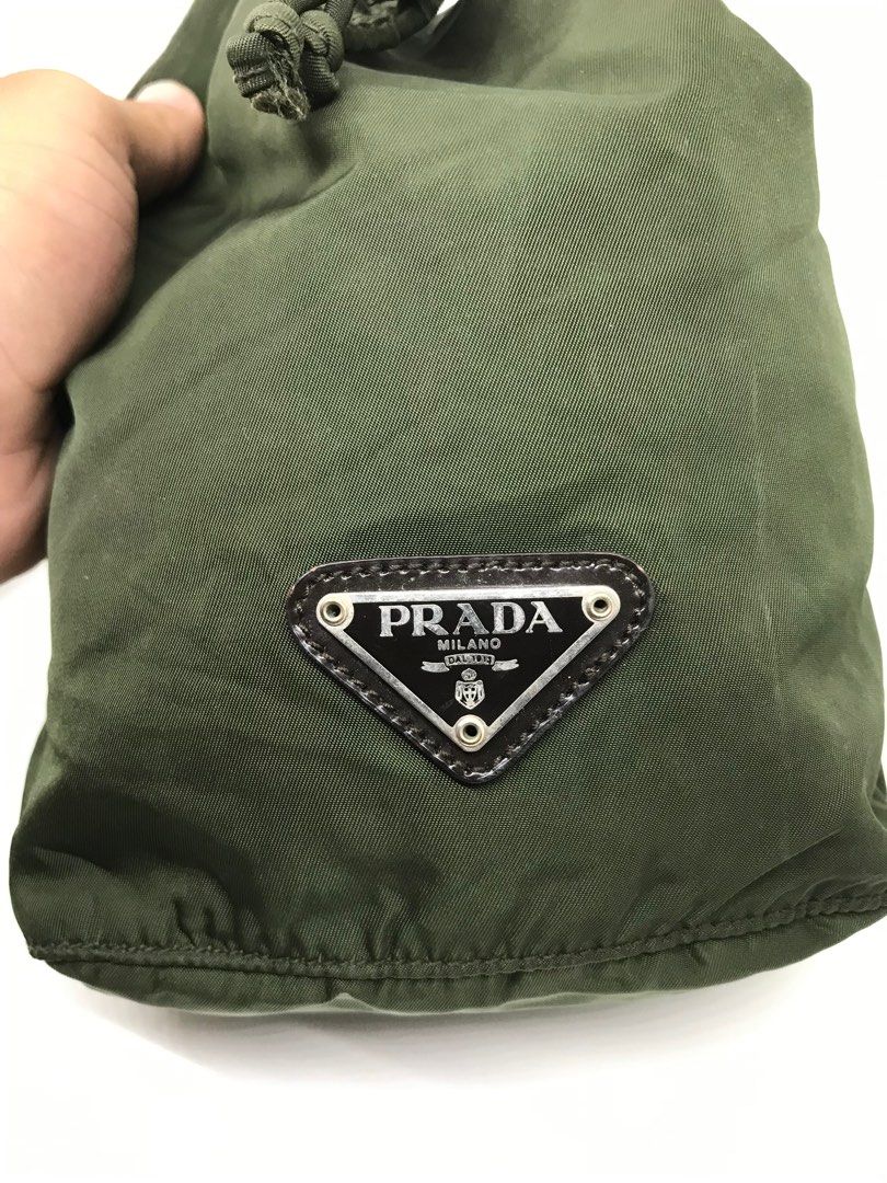 Prada Nylon Triangle Logo Drawstring Pouch (Category: Luxury Bags & Wallets) located in Cabanatuan. Submitted by cabsygoods (Listing ID 1399514402, Image 3). Description: Prada Nylon Triangle Logo Drawstring Pouch Very good condition Issue removable stain Color rate 9/10 Still presentable Dm to purchase! 📩.
