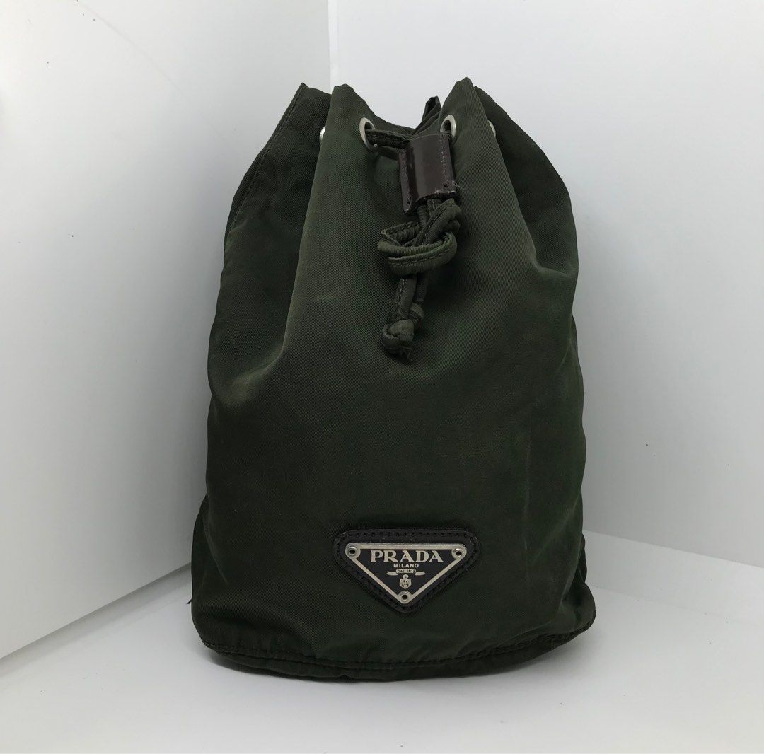 Prada Nylon Triangle Logo Drawstring Pouch (Category: Luxury Bags & Wallets) located in Cabanatuan. Submitted by cabsygoods (Listing ID 1399514402, Image 1). Description: Prada Nylon Triangle Logo Drawstring Pouch Very good condition Issue removable stain Color rate 9/10 Still presentable Dm to purchase! 📩.