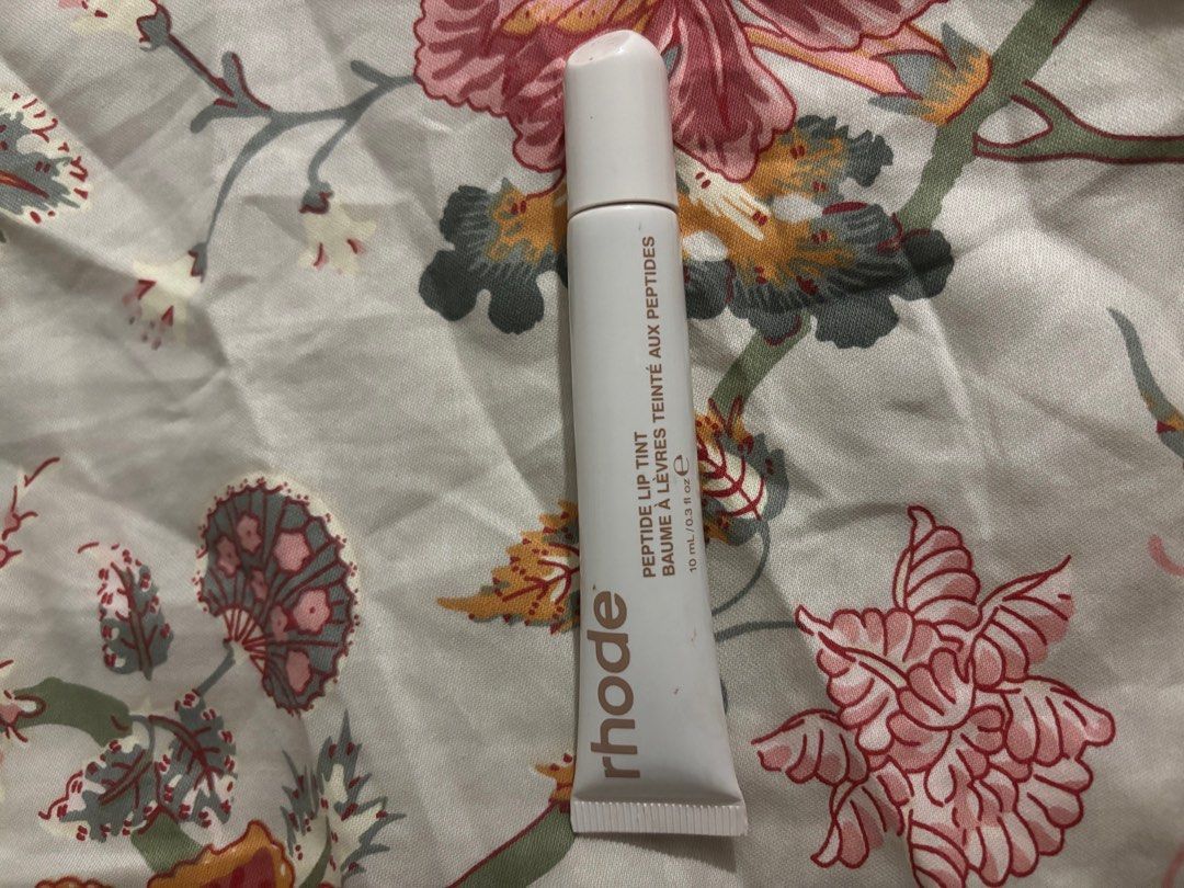 Rhode Peptide Lip Tint Cinnamon Roll (Limited Edition) (Category: Makeup) located in Las Pinas. Submitted by gabriellen10737 (Listing ID 1399587186, Image 1). Description: Rhode peptide lip tint cinnamon roll Like new about 90-95% full Rfs: scent is not for me Location: Las Pinas City MOD: same day/j&t/ggx MOP: gcash/bdo/gotyme Dm for more details .