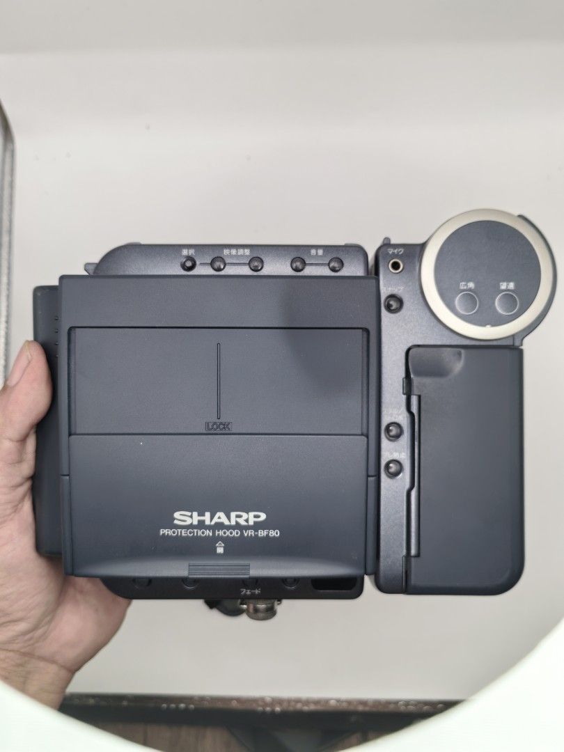 Sharp Hi8 Viewcam (Category: Cameras) located in Cebu City. Submitted by dudes_villanueva (Listing ID 1399458830, Image 2). Description: Sharp Hi8 Viewcam Model: VL-HL1. Note: Untested‼️‼️‼️ No Battery Pack. Sold as is. All sales final and Non-refundable. Condition: Clear Lens. No Fungus. 📌This model was notable for replacing the traditional viewfinder with a liquid crystal display (LCD) monitor, which allowed users to view what they were record