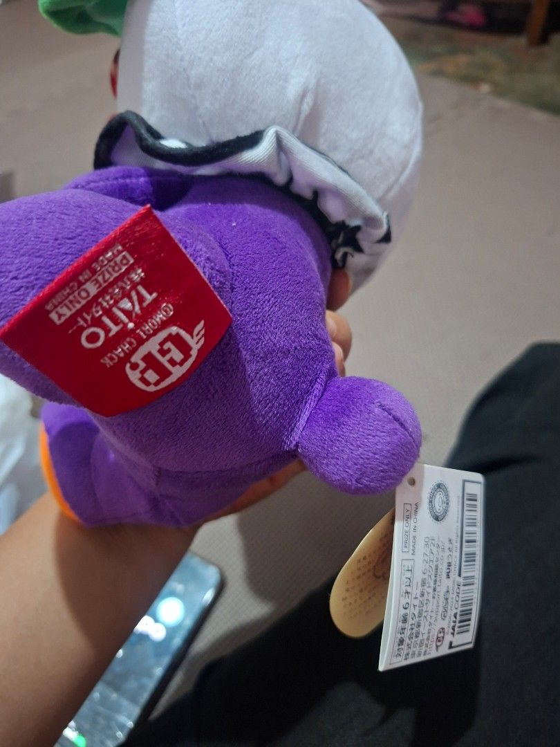 Taito Omori Grace Plush Toy (Category: Plushies & Soft Toys) located in Manila. Submitted by ghibz (Listing ID 1399539728, Image 3). Description: - Taito Omori Grace plush toy - Unique clown-like face design - Purple body - Includes original tag - Made in China - Ideal for plush toy collectors.