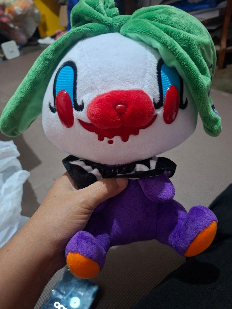 Taito Omori Grace Plush Toy (Category: Plushies & Soft Toys) located in Manila. Submitted by ghibz (Listing ID 1399539728, Image 1). Description: - Taito Omori Grace plush toy - Unique clown-like face design - Purple body - Includes original tag - Made in China - Ideal for plush toy collectors.