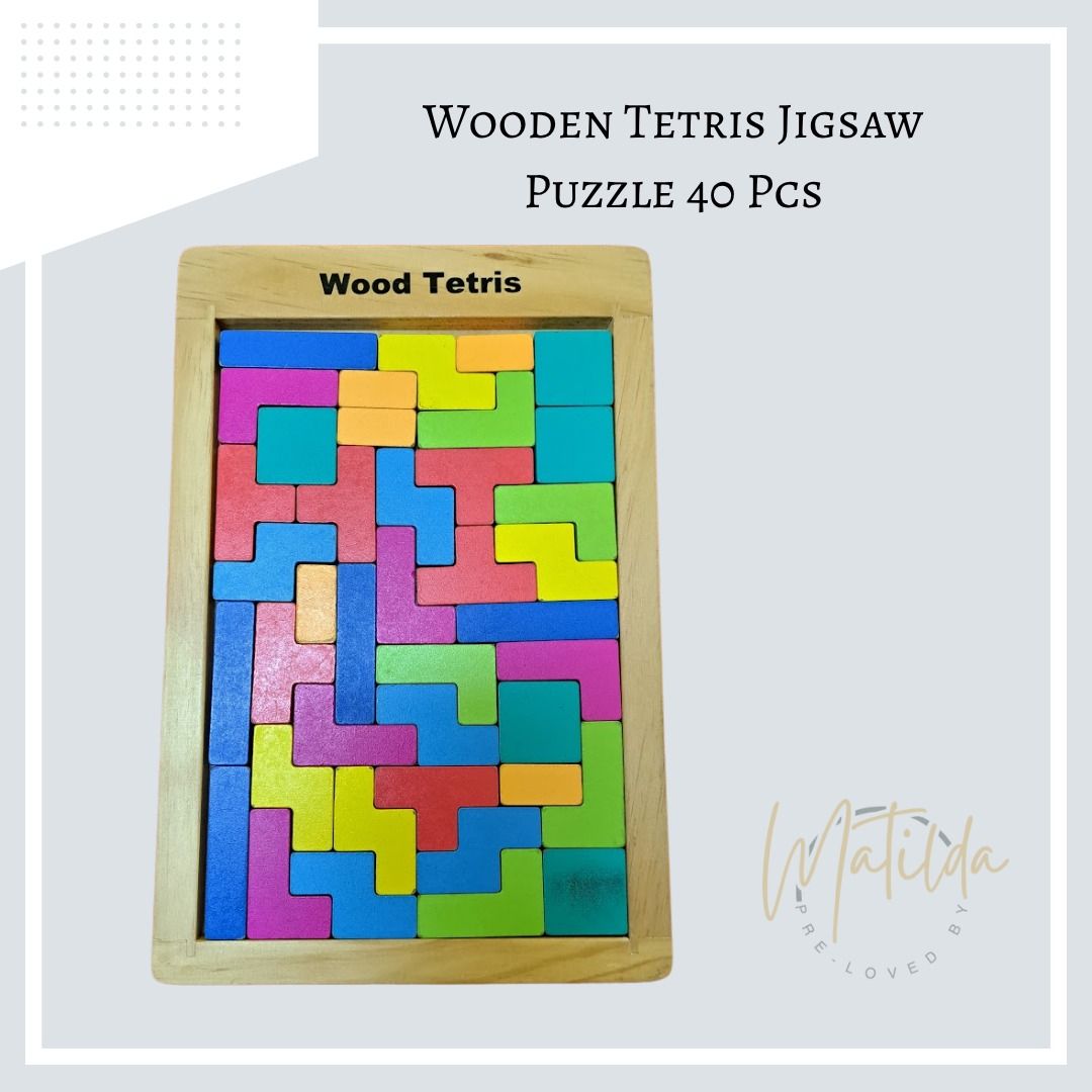 Wooden Tetris Jigsaw Puzzle (Category: Board Games & Puzzles) located in Quezon City. Submitted by matilda12204 (Listing ID 1379192351, Image 1). Description: Wooden Tetris Jigsaw Puzzle Introducing a comprehensive set of Tetris blocks designed to stimulate the eyes, hands, and mind! -Crafted with vibrant, non-toxic paints to ensure safety and appeal. -Engaging colors that encourage problem-solving skills. -This set includes 40 pieces along with 