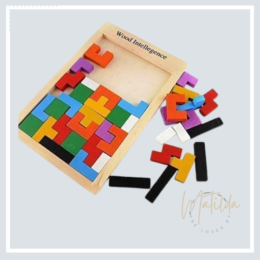 Wooden Tetris Jigsaw Puzzle (Category: Board Games & Puzzles) located in Quezon City. Submitted by matilda12204 (Listing ID 1379192351, Image 2). Description: Wooden Tetris Jigsaw Puzzle Introducing a comprehensive set of Tetris blocks designed to stimulate the eyes, hands, and mind! -Crafted with vibrant, non-toxic paints to ensure safety and appeal. -Engaging colors that encourage problem-solving skills. -This set includes 40 pieces along with 