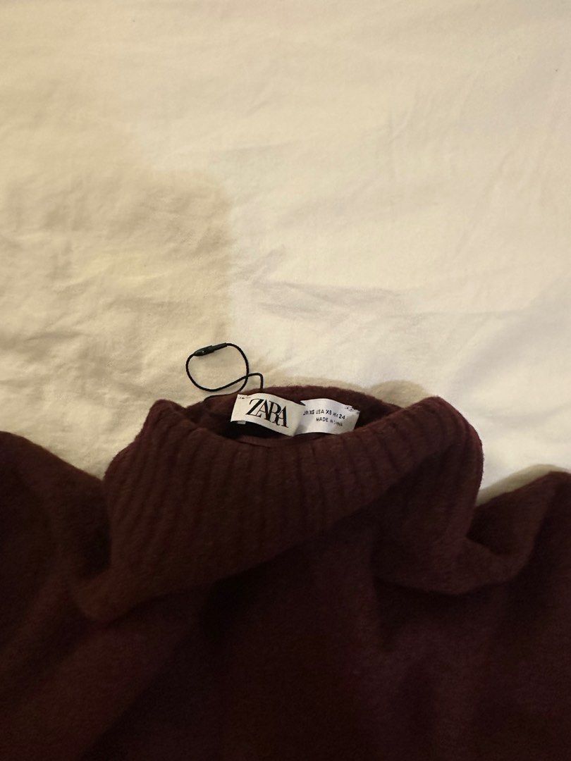 Zara Maroon Turtleneck Sweater (Category: Longsleeves) located in Manila. Submitted by kaitdeclutters (Listing ID 1399607566, Image 3). Description: - Zara maroon turtleneck sweater - Cropped style - Long sleeves - Ribbed neckline, cuffs, and hem - Soft, textured knit fabric - Perfect for layering - Brand new with tag.