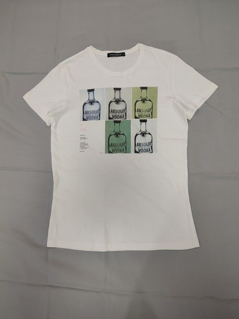 Absolut Vodka Graphic T-shirt (Category: Shirts) located in Dasmarinas. Submitted by sbtt_ (Listing ID 1399701268, Image 3). Description: - Absolut Vodka graphic t-shirt - Features a pop art style print - Design includes Absolut Vodka bottles - Crew neck and short sleeves - Brand name visible.