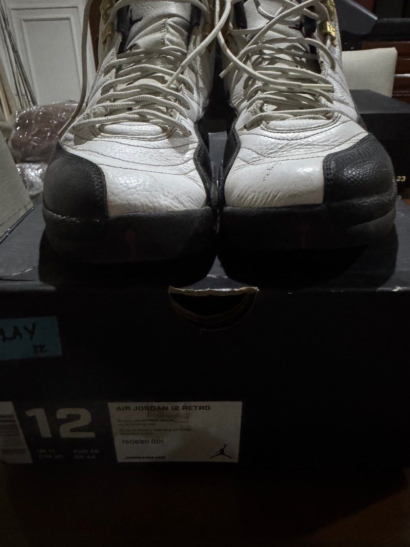 Air Jordan 12 Retro White Black (Category: Sneakers) located in Quezon City. Submitted by tinylee60 (Listing ID 1399763782, Image 1). Description: - Air Jordan 12 Retro sneakers - Color: White and Black - Size 12 - Includes original box.