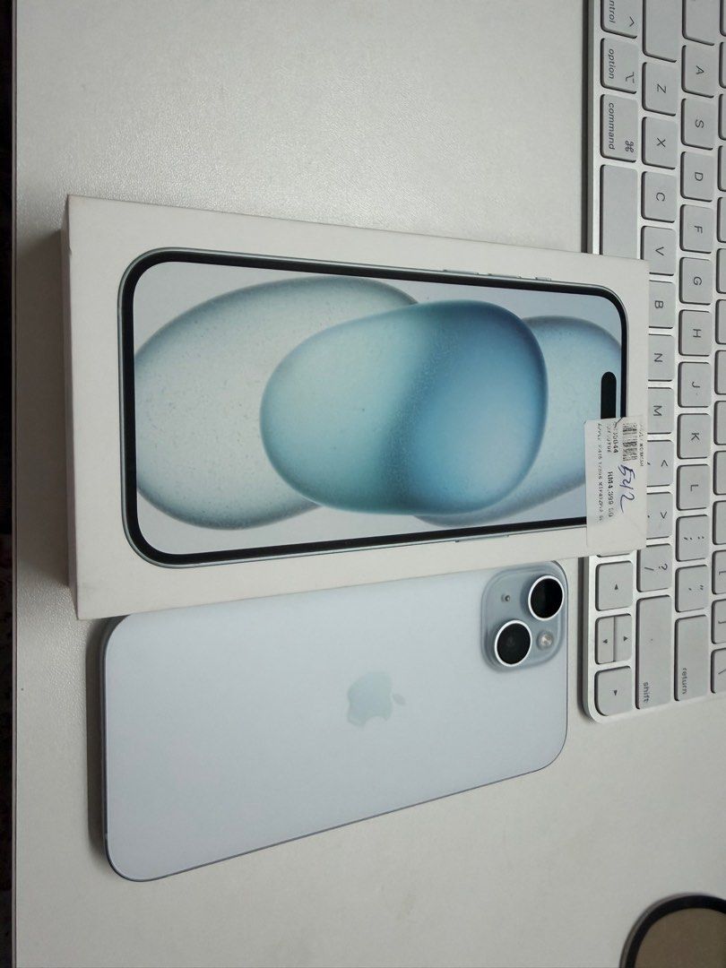 (Category: iPhone 15 Series) located in Singapore. Submitted by moocatmoo (Listing ID 1399776966, Image 2). Description: - iPhone 15 (Blue) - 128GB storage - Battery Health: 85% (561 cycles) - Manufactured: November 2023 - First Used: February 2024 - Includes original box, but no wire inside - no scratch, no dent, no defects - First bought from Harvey Norman Malaysia - will pass you all my screen protector and case - only meet ups.