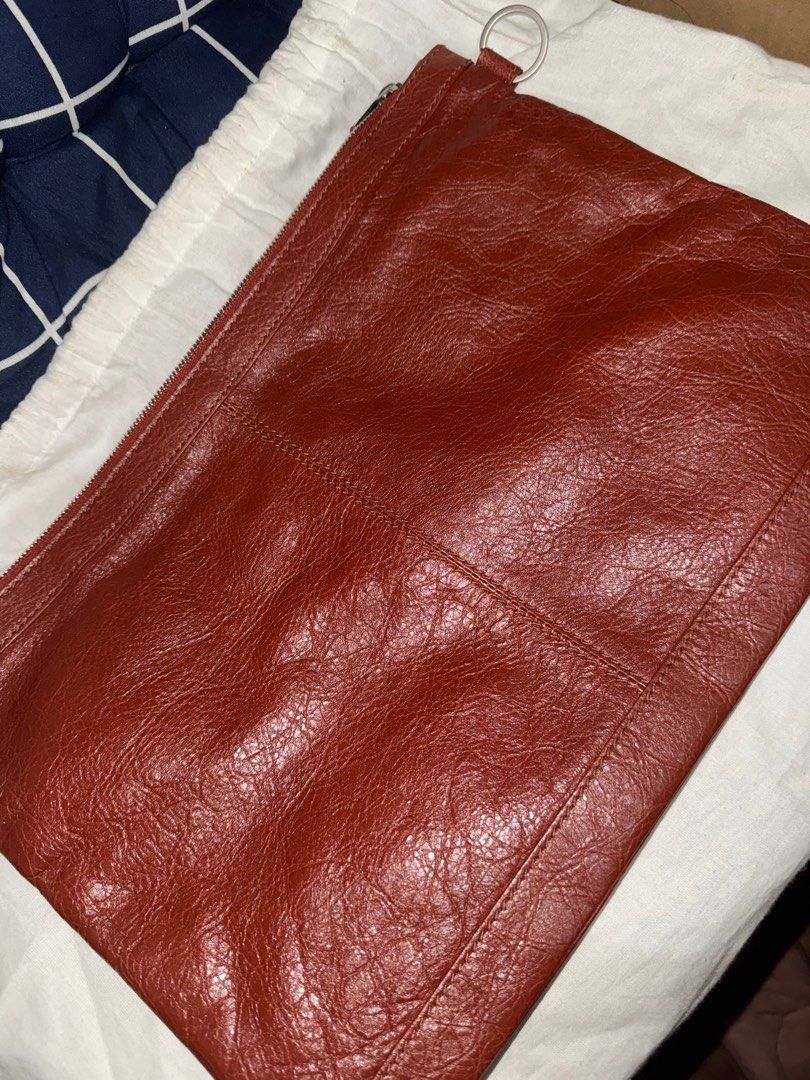 Balenciaga Leather Clutch (Category: Luxury Bags & Wallets) located in Manila. Submitted by mabuhaymiles (Listing ID 1399785065, Image 2). Description: .