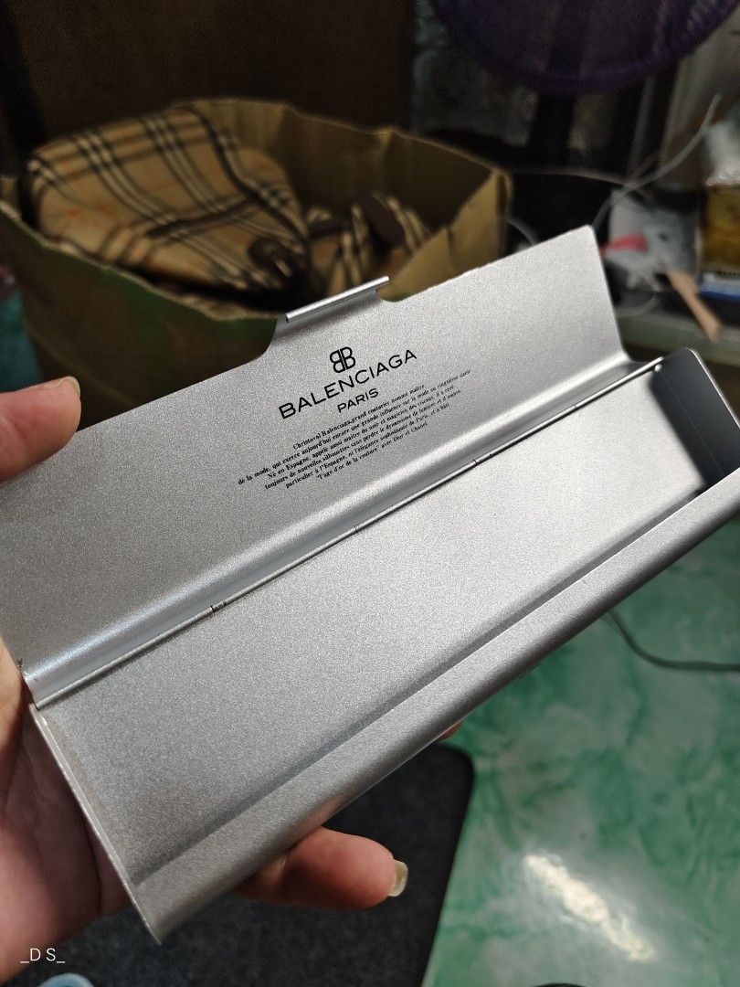 Balenciaga pen Case (Category: Luxury Bags & Wallets) located in Lucena. Submitted by dai_suki (Listing ID 1399788063, Image 2). Description: - Balenciaga pen case - Silver color - Features Balenciaga logo (exterior & interior) - Made of metal - Sleek and stylish design - Ideal for carrying cards.