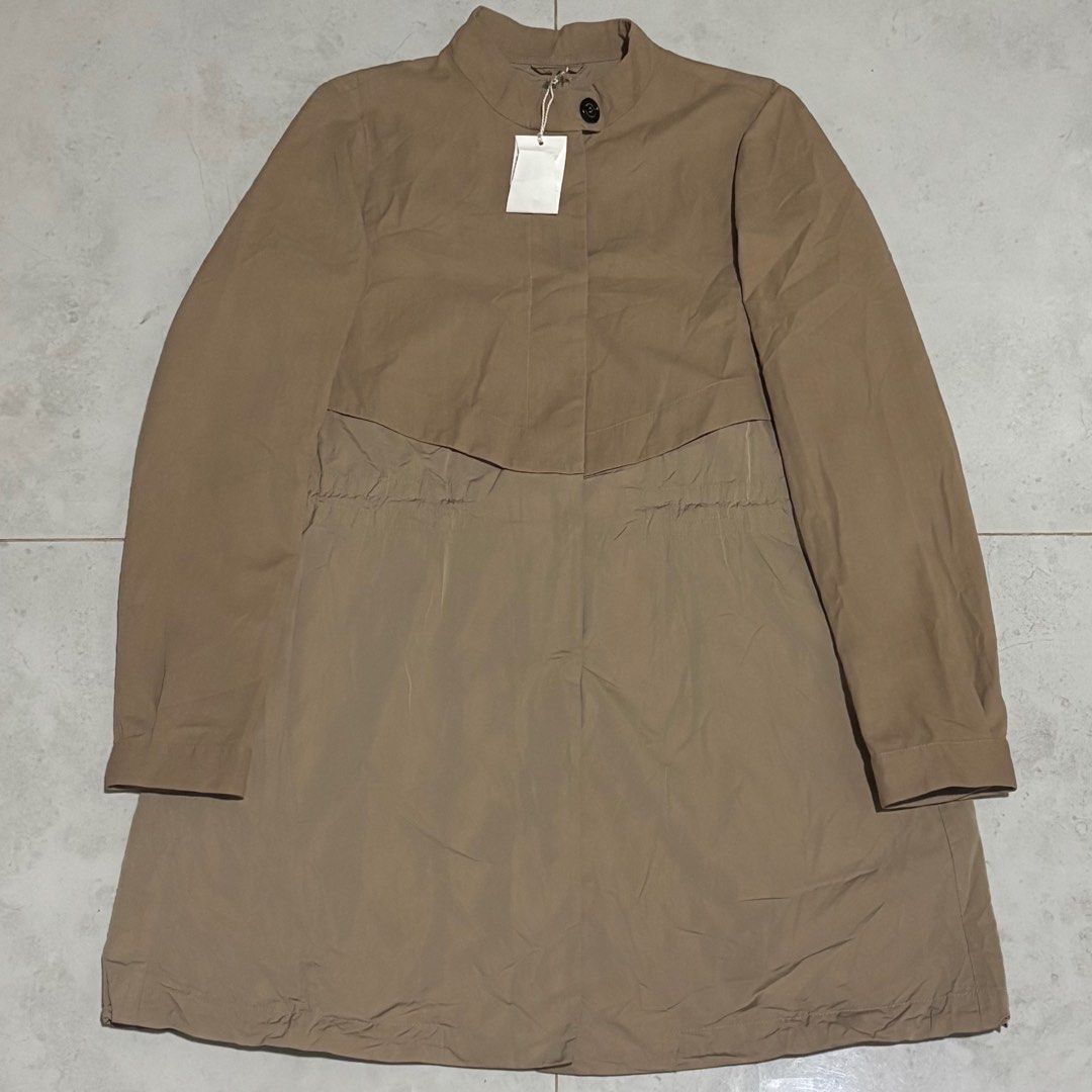 Brunello cucinelli beige trench coat jacket (Category: Luxury Apparel) located in Cebu City. Submitted by florianmiral (Listing ID 1399789283, Image 1). Description: Brunello cucinelli beige trench coat jacket Excellent condition with minor flaw due to sign of usage, please check last photo. Still presentable and wearable 42 on tag W 20.5 L 35 Sleeve length 25.
