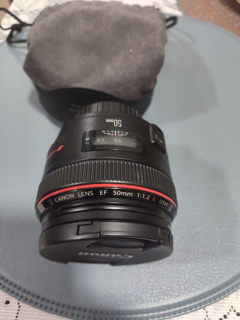 Canon EF 50mm 1.2 L USM Lens (Category: Lens & Kits) located in Lapu-Lapu City. Submitted by williamzane (Listing ID 1399774227, Image 2). Description: Canon 50mm 1:1.2 USM L series lens kept in dry box no more box no hood will include pouch very clean lenses included ND2 filter pwede sa maselan. no scratches no dings. used it on manual focus mode for studio so USM motor is in virgin condition. i will give your money back if the AF motor dies wit