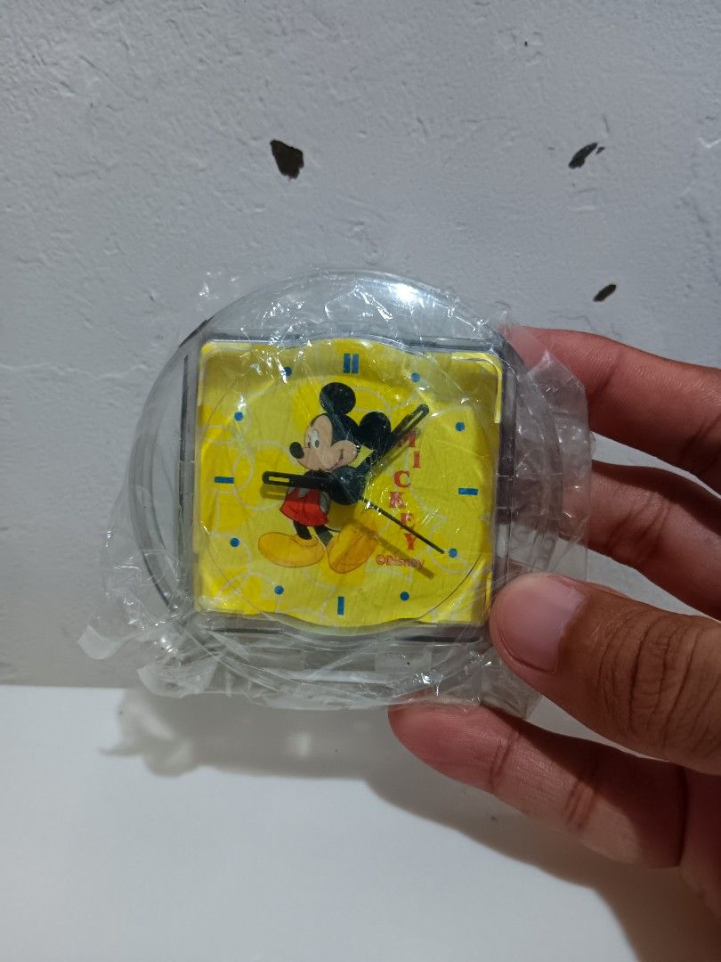Disney Mickey Mouse Alarm Clock Vintage (Category: Clocks) located in Manila. Submitted by roshisneakerhouse (Listing ID 1399672431, Image 3). Description: - Disney Mickey Mouse alarm clock Vintage - Brand new, in original packaging - Features a yellow clock face - Adorned with classic Mickey Mouse graphics - Clear plastic casing -Courier:Lalamove/Grab Express/J&T -PM lang po.