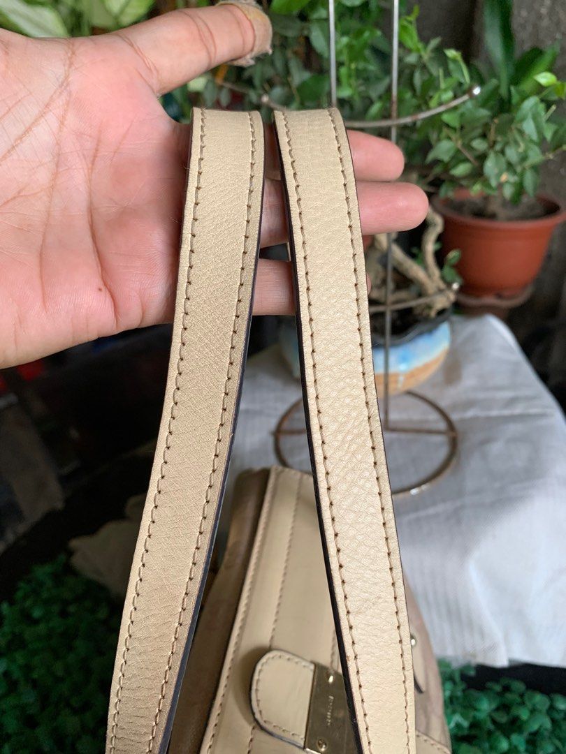 Gucci Beige Handbag with Key (Category: Luxury Bags & Wallets) located in General Santos City (Dadiangas). Submitted by h_thrift_luxxe (Listing ID 1399819553, Image 2). Description: Japan ukay box source Coded Minor issues back only not visible With lock .