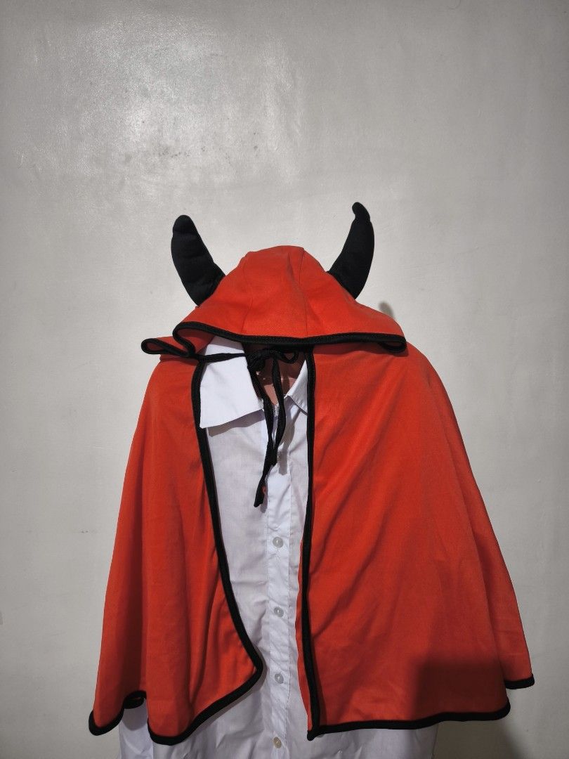 Halloween Costume Devil Costume with Horns (Category: Babies & Kids Fashion) located in Marikina City. Submitted by alecfordy (Listing ID 1399826609, Image 2). Description: - Red devil cape with black trim - Attached hood - Includes black horns - Drawstring closure Halloween Costume - Perfect for Halloween or costume parties.