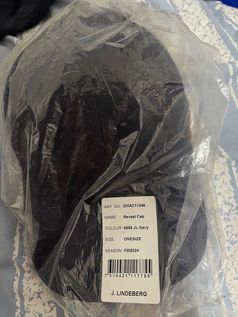 J Lindeberg Reveal Cap (Category: Caps & Hats) located in Santa Rosa. Submitted by miggy_30 (Listing ID 1399761613, Image 2). Description: Bnew still in packaging Rfs : nadouble order from US.