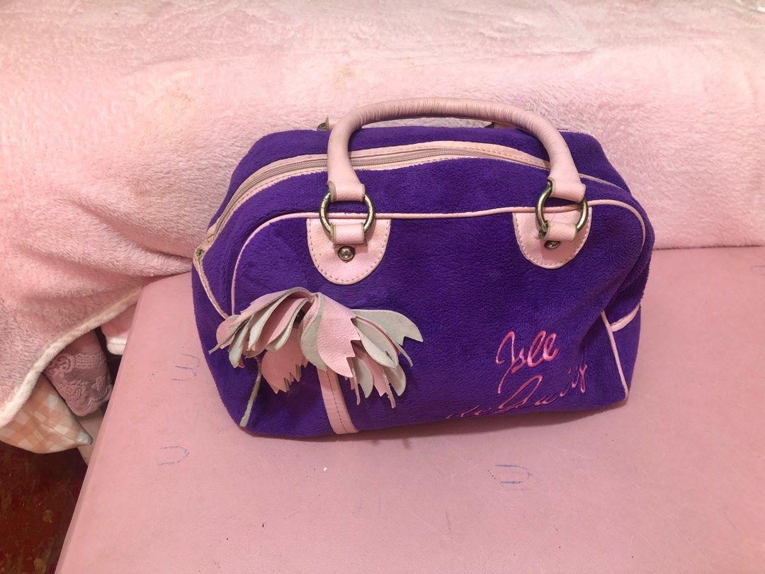 Juicy couture bag (Category: Tote Bags) located in Las Pinas. Submitted by juuzzmeeh2021 (Listing ID 1399801809, Image 1). Description: Authentic. Well used. There are just some chirping in handle and pipeline but can still be used. Unnoticeable.