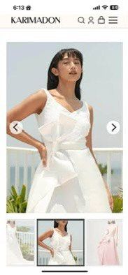 Karimadon White Wedding Dress (Category: Evening dresses & gowns) located in Angono. Submitted by declutteringpj (Listing ID 1399798471, Image 3). Description: Selling my sister's Karimadon gown used last October 2024. Slightly altered. Pinalipat ko yung ribbon sa likod. See photo for the original. May slit sya mga mhie. Rfs: served its purpose na. Note: not yet dry cleaned Gown size: small Bride height: 5'3 Body - 34-27-34 Original price: P6,999