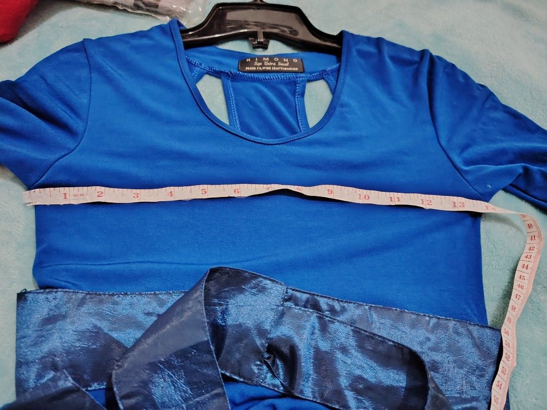 Kimono Blue Dress XS (Category: Dresses) located in Manila. Submitted by shemstepszi (Listing ID 1399651083, Image 3). Description: - Kimono blue dress - Size: Extra Small (XS) - Features a keyhole back - Includes a matching blue sash - Three-quarter sleeves - Measurements in photos - Proudly Filipino made, perfect for events or any occasion. Flowy dress, hindi mainit ang tela. Need to declutter, di na kasya sa akin. Bought it for 2000+, selling 