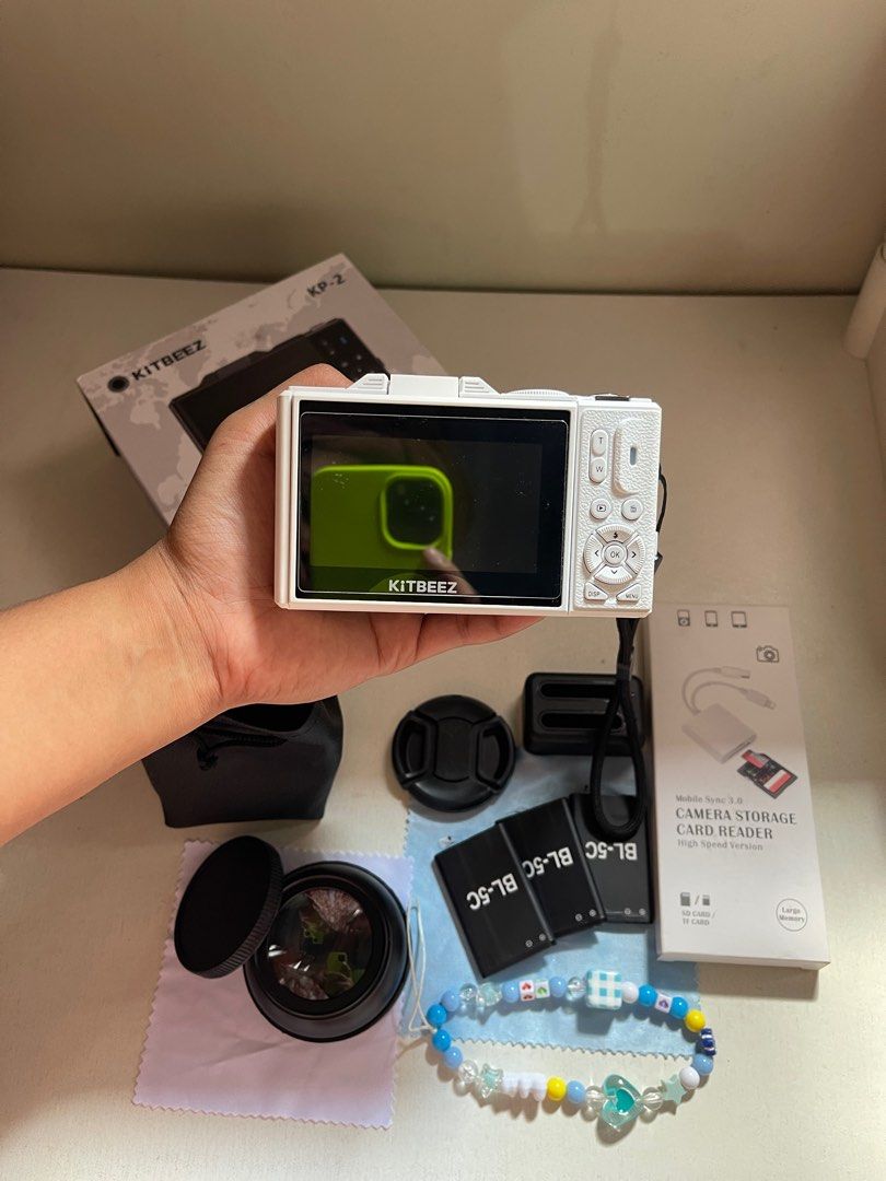 Kitbeez KP-2 5K Ultra Digital Camera (Category: Cameras) located in Malabon City. Submitted by cosmicowl.309855 (Listing ID 1399724451, Image 2). Description: impulsive purchase - Kitbeez KP-2 5K Ultra Digital Camera - Includes: - Camera - Extra Lens - Two Batteries - Charger - Card Reader - Carrying Bag - Wrist Strap - Original Box - Digital Zoom Lens - Bonus: Bracelet.