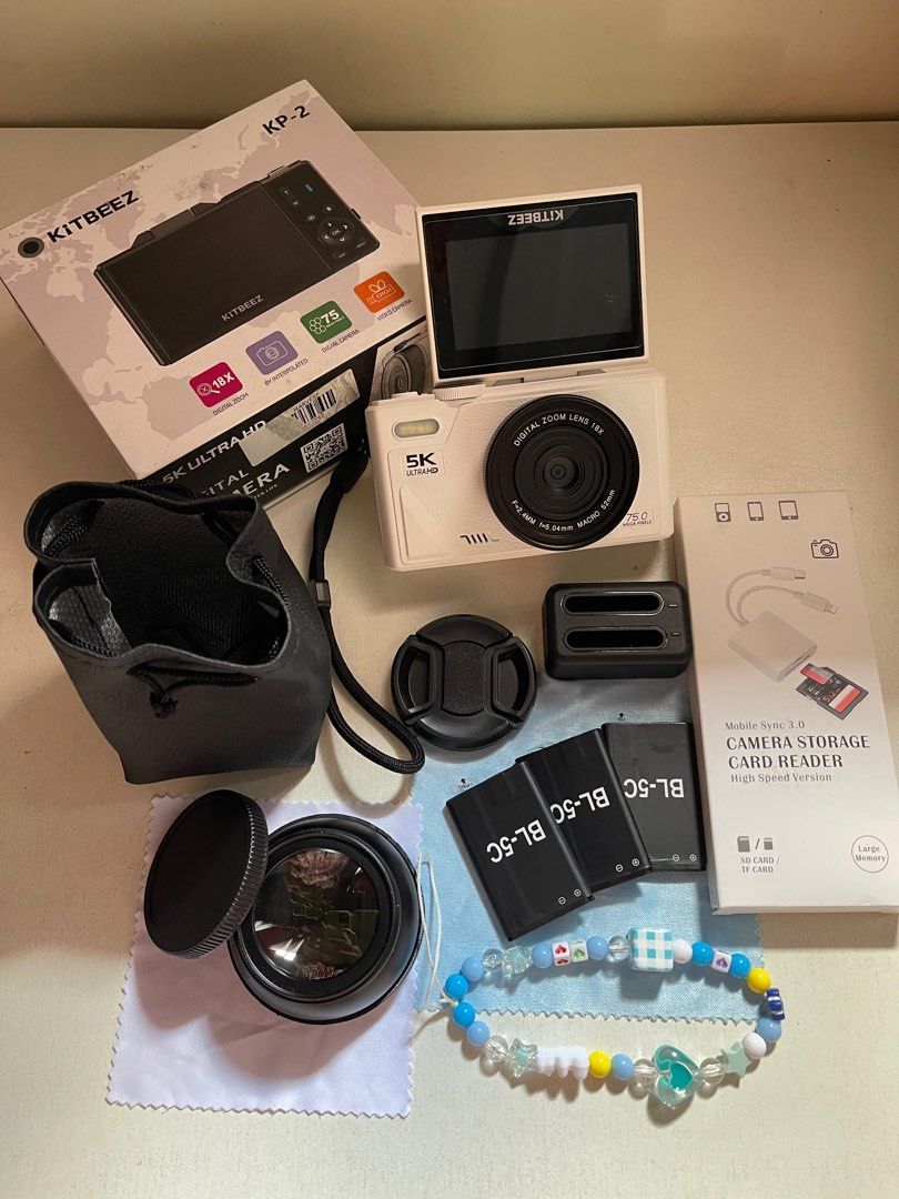 Kitbeez KP-2 5K Ultra Digital Camera (Category: Cameras) located in Malabon City. Submitted by cosmicowl.309855 (Listing ID 1399724451, Image 1). Description: impulsive purchase - Kitbeez KP-2 5K Ultra Digital Camera - Includes: - Camera - Extra Lens - Two Batteries - Charger - Card Reader - Carrying Bag - Wrist Strap - Original Box - Digital Zoom Lens - Bonus: Bracelet.