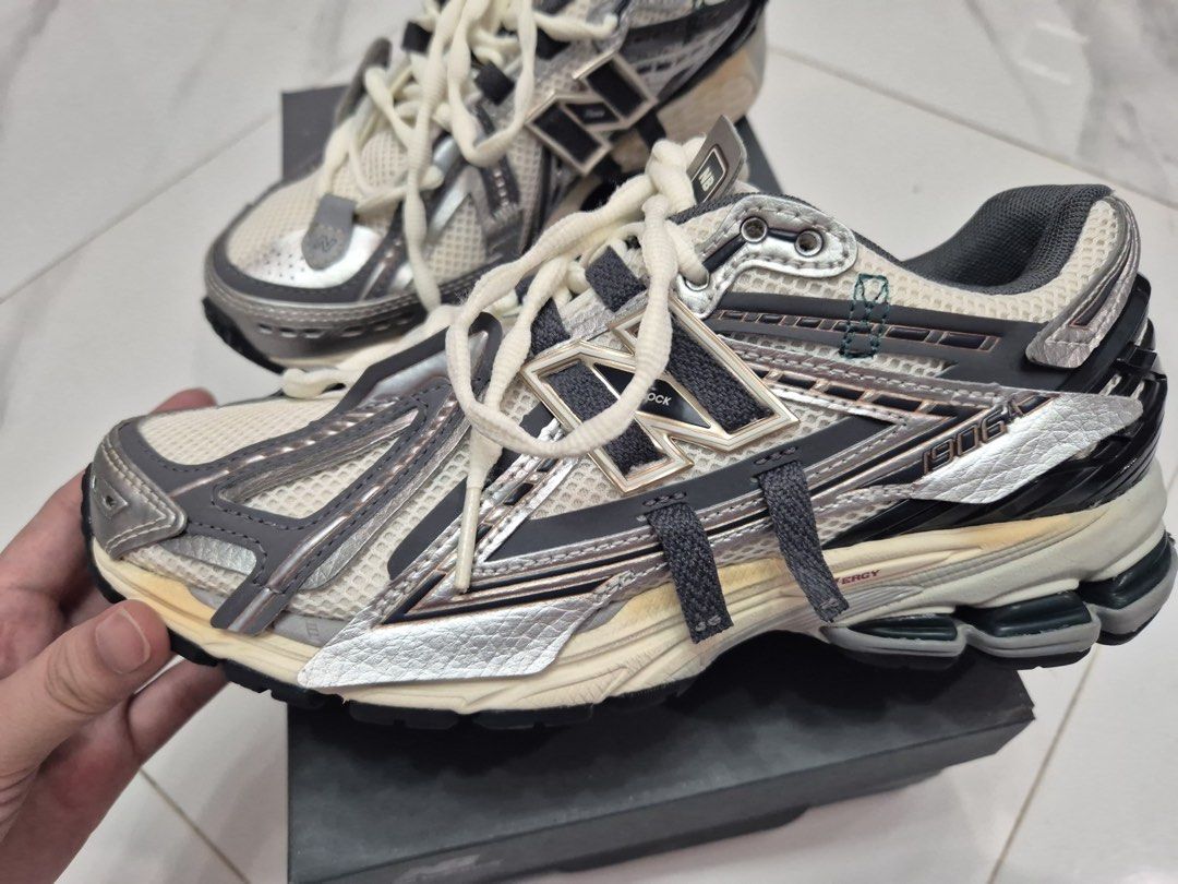 NEW BALANCE 1906A TECH EXPLOSION (Category: Sneakers) located in Bulacan. Submitted by operationdeclutter96 (Listing ID 1399825593, Image 2). Description: Good as new. Only used once. Minor issue: small chipped sa heel - see pic below Bought this for 10k.