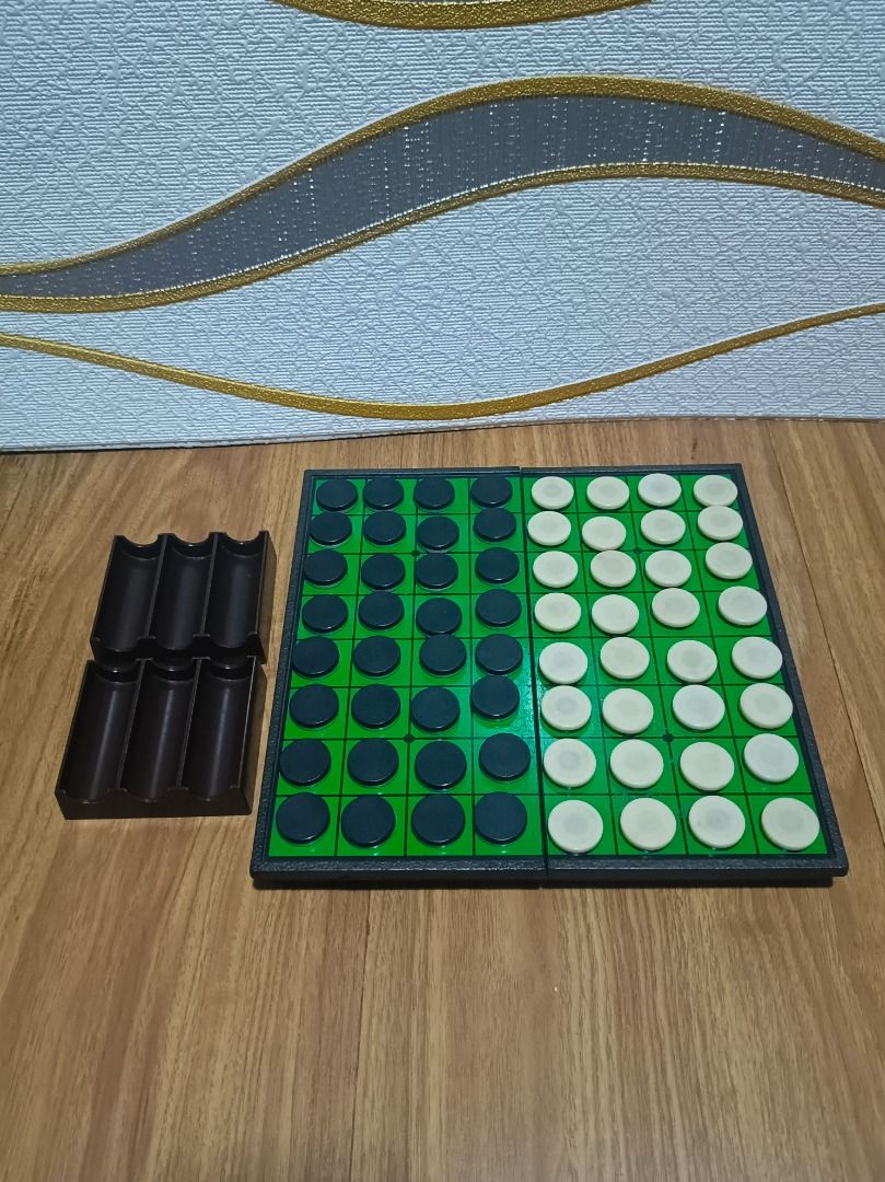 OTHELLO MAGNETIC BOARD GAME (Category: Board Games & Puzzles) located in Makati City. Submitted by nyxhemera26 (Listing ID 1399801933, Image 1). Description: OTHELLO MAGNETIC BOARD GAME • COMPLETE BUT MAY SCRATCHES NA BOARD.