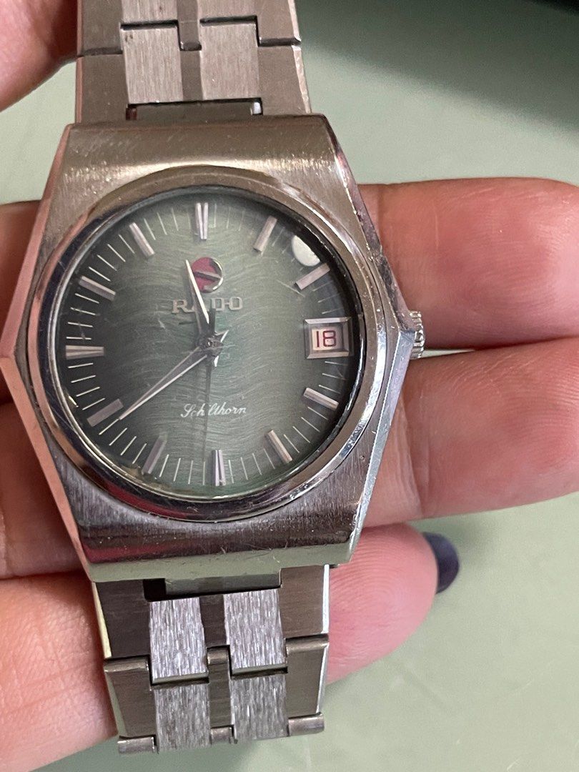 Rado Diastar Watch (Category: Luxury Watches) located in Cavite. Submitted by mamamia73 (Listing ID 1399822998, Image 1). Description: - Vintage Rado Diastar watch - Silver-tone stainless steel bracelet and case - Green dial with silver-tone hands and markers - Date display at 3 o'clock - Stainless steel case back - Unique hexagonal shape Working excellent automatic .