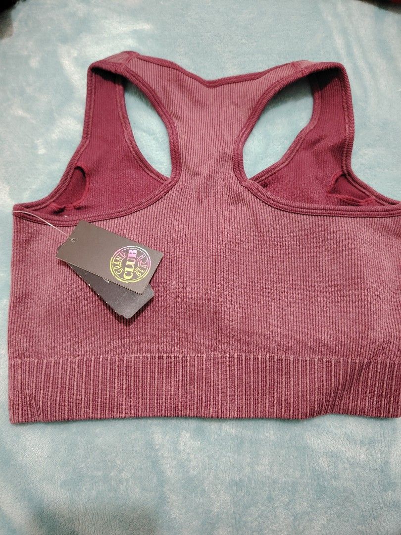 Ribbed Sports Bra - Size M (Category: Activewear) located in Manila. Submitted by shemstepszi (Listing ID 1399645669, Image 2). Description: - Maroon ribbed sports bra - Size: Medium - Racerback style - Seamless design for comfort - Soft and stretchy material - Perfect for workouts or everyday wear - Brand new with tags. Bust 13".