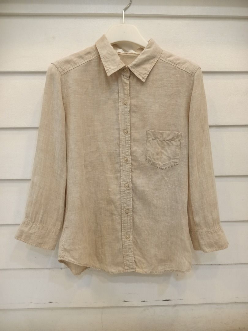 Uniqlo Linen Shirt 3/4 (Category: Shirts) located in Bacolod City. Submitted by sherylplot43773 (Listing ID 1399518849, Image 1). Description: - Uniqlo linen shirt - Bust: 18inches - Lenght: 23 inches - Size medium on tag (runs small) - Kasya xs-small - Neutral beige color - Button-down style - Features a single chest pocket - Long sleeves - Made of 100% linen - Made in China.
