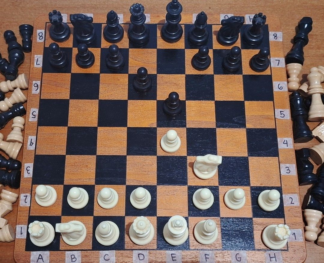 Wooden Chess Set (Category: Board Games & Puzzles) located in Antipolo. Submitted by desireekay70914 (Listing ID 1399721985, Image 1). Description: - Complete chess set - Wooden chessboard with removable labeled squares - Includes black and white chess pieces - Set includes both wooden and plastic pieces - Standard size board - Ready for play! no issue..