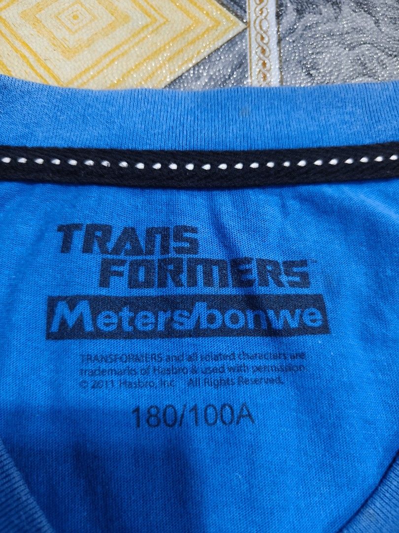 ©2011 TRANSFORMERS (Category: Tshirts & Polo Shirts ) located in Antipolo. Submitted by earlcollections (Listing ID 1399831797, Image 2). Description: METERS/BONWE (©2011 TRANSFORMER) 21*27 Colorate 9.8/10 STAIN NEED WASH.