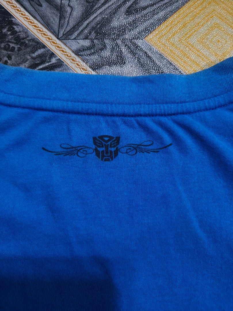©2011 TRANSFORMERS (Category: Tshirts & Polo Shirts ) located in Antipolo. Submitted by earlcollections (Listing ID 1399831797, Image 3). Description: METERS/BONWE (©2011 TRANSFORMER) 21*27 Colorate 9.8/10 STAIN NEED WASH.