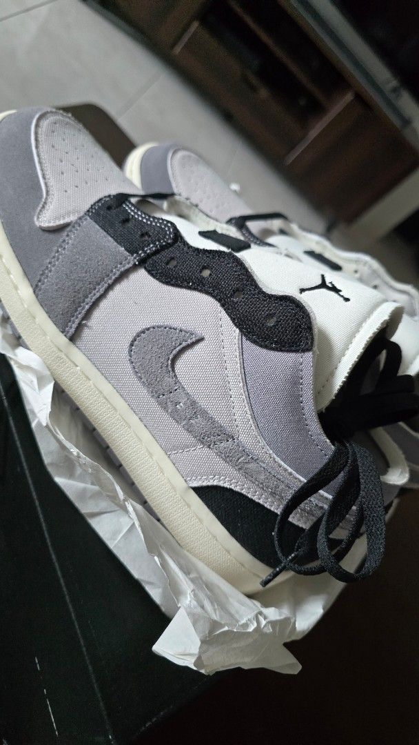 Air Jordan 1 Low SE Craft (Category: Sneakers) located in San Juan City. Submitted by aivveee (Listing ID 1399941282, Image 3). Description: Air Jordan 1 Low SE Craft in grey and black. Features a canvas and suede upper with a stitched Swoosh. Includes the original box. Size 11 US. The box indicates the colorway is "Grey/Black-Phantom-Sail"..