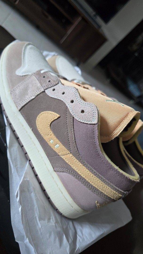 Air Jordan 1 Low SE Craft (Category: Sneakers) located in San Juan City. Submitted by aivveee (Listing ID 1399941709, Image 1). Description: Air Jordan 1 Low SE Craft in a unique colorway. Features a mix of brown, beige, and cream tones. The shoes have a textured design with the iconic Nike swoosh. Includes the original box. Size 11..