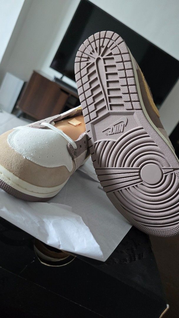 Air Jordan 1 Low SE Craft (Category: Sneakers) located in San Juan City. Submitted by aivveee (Listing ID 1399941709, Image 2). Description: Air Jordan 1 Low SE Craft in a unique colorway. Features a mix of brown, beige, and cream tones. The shoes have a textured design with the iconic Nike swoosh. Includes the original box. Size 11..