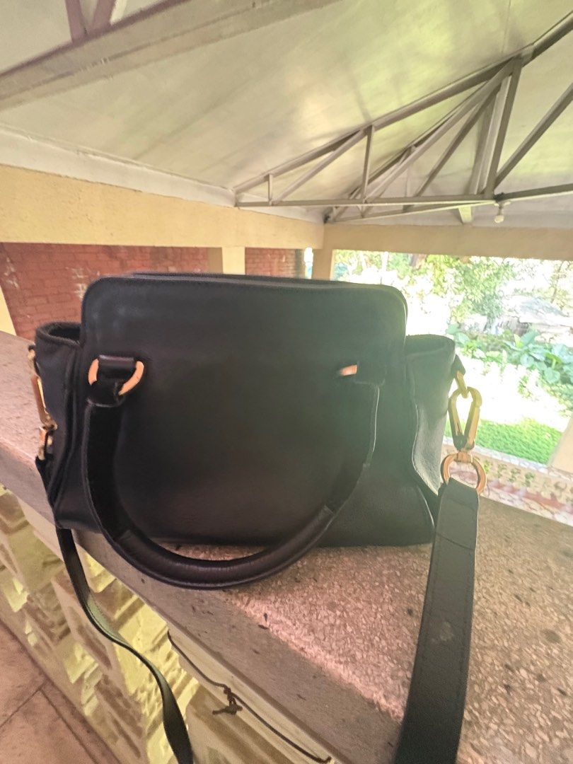 Authentic See by Chloe Black Top Handle Mini Bag (Category: Luxury Bags & Wallets) located in Quezon City. Submitted by gringottsss (Listing ID 1399831153, Image 3). Description: PLEASE READ Issue: Signs of use, please refer to photos This bag has that rugged vibe similar to Balenciaga’s city bag Dimensions: Width - 23.5; Height - 15.5; Depth - 12.5 cm Handle Drop: 7 cm (approx.) Long Strap Drop: 50/55 cm (approx.).