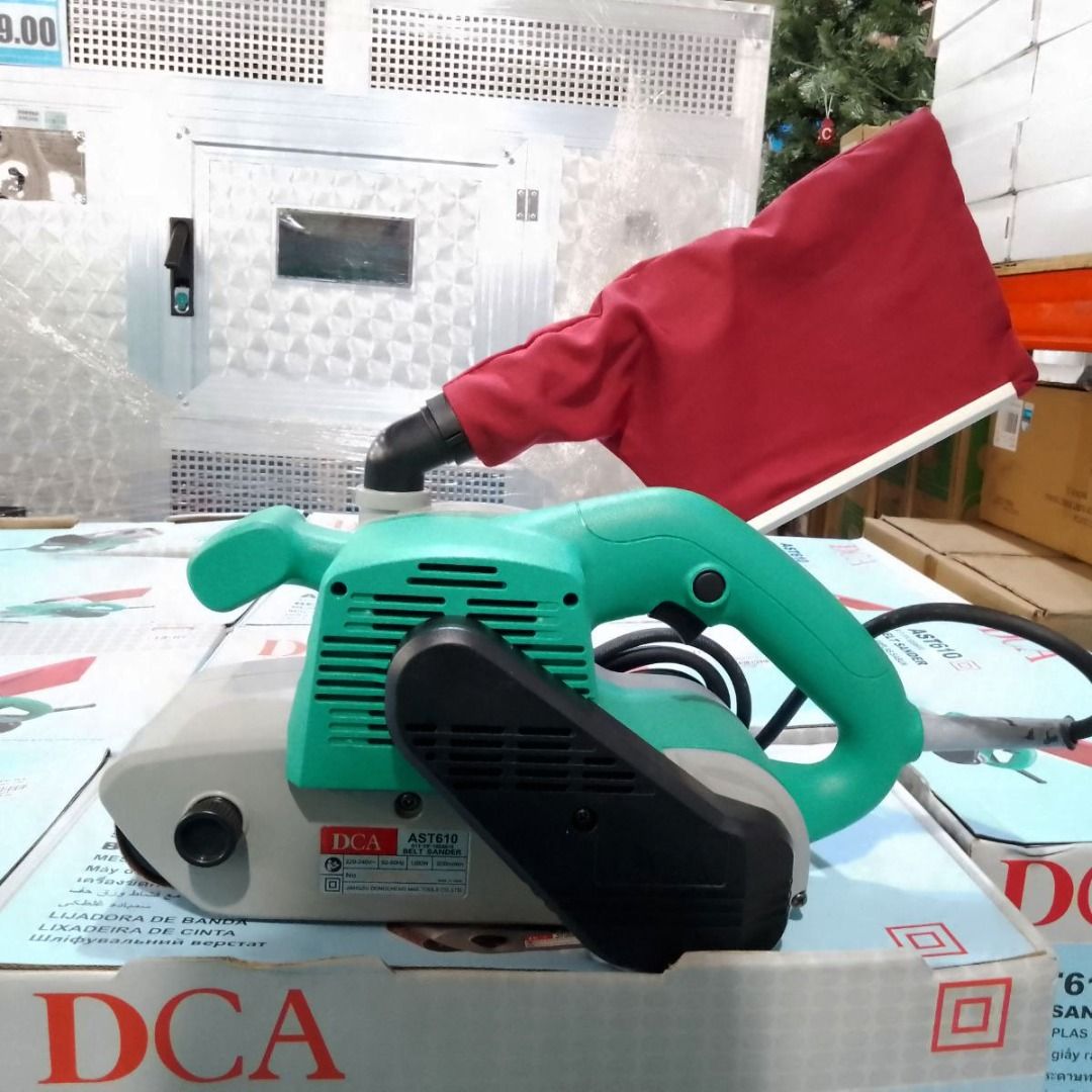 DCA Belt Sander AST610 (Category: Construction Tools & Equipment) located in Paranaque City. Submitted by ivy69425 (Listing ID 1399850694, Image 1). Description: Click the link for more info: https://hmr.ph/product/dca-belt-sander-ast-610 Features: • Powerful Motor: 1200W motor ensures high-efficient operation for demanding tasks. • Durable Design: Tank-type structured body and aluminum housing (according to some sources) for strength. • Large Sa