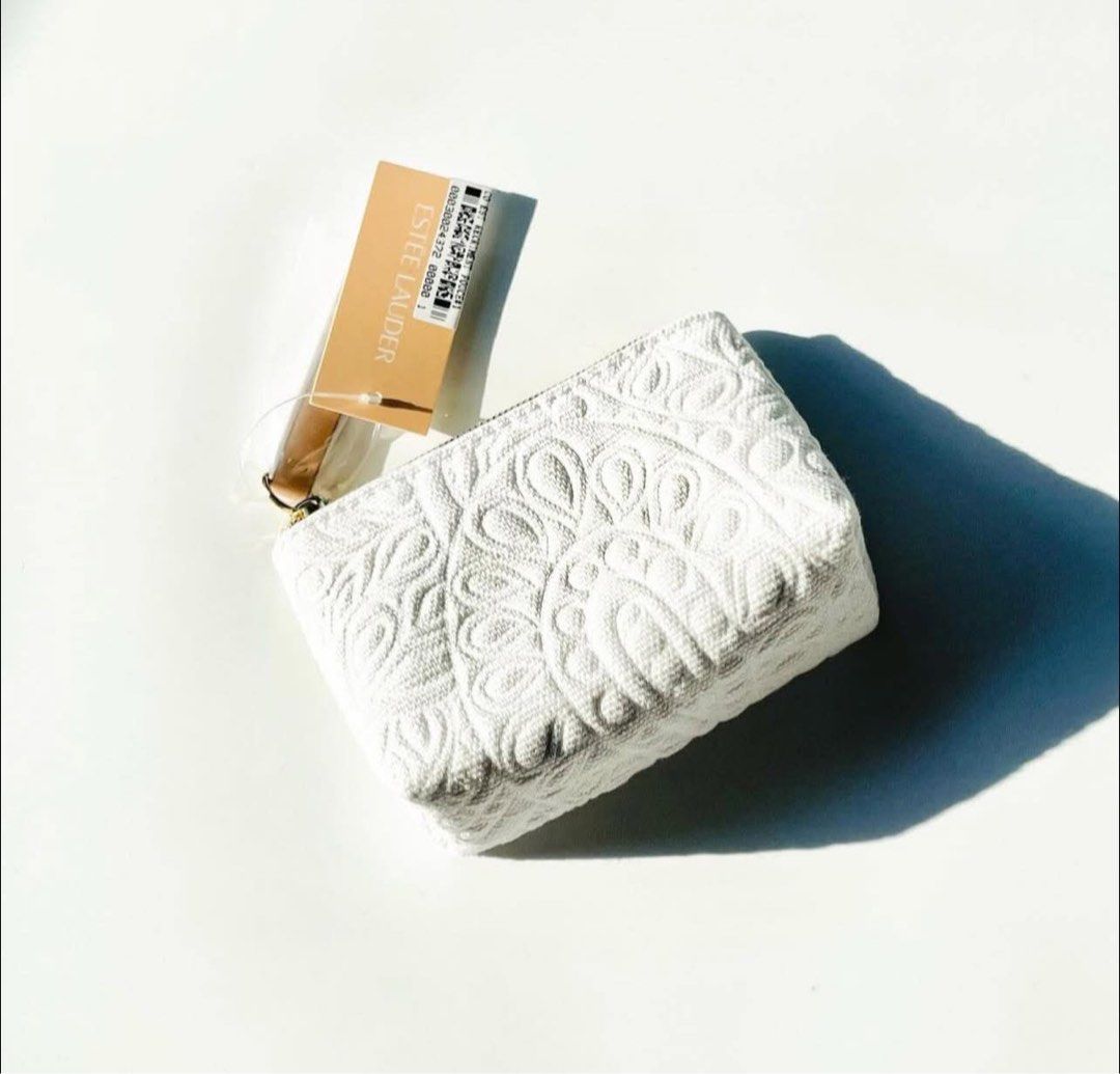 Estee Lauder white floral small pouch (Category: Purses & Pouches) located in Paranaque City. Submitted by mrdy_. (Listing ID 1399955269, Image 2). Description: Pre order. ETA NOV Perfect lang gift / give away limited slots only. Pareserve na po. .