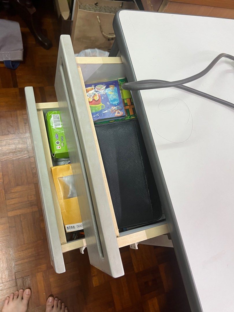 Grey study table (Category: Tables & Sets) located in Singapore. Submitted by decluttereverything123 (Listing ID 1399960021, Image 2). Description: Sturdy table have used it for long, moving house hence selling, please arrange own transport, location is near Lorong Chuan .